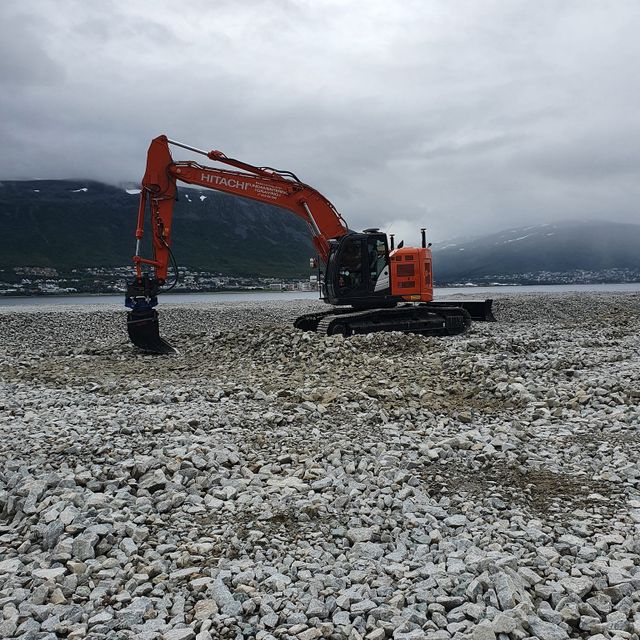 Gravemaskin i arbeid