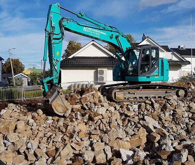 Massetransport gravemaskin